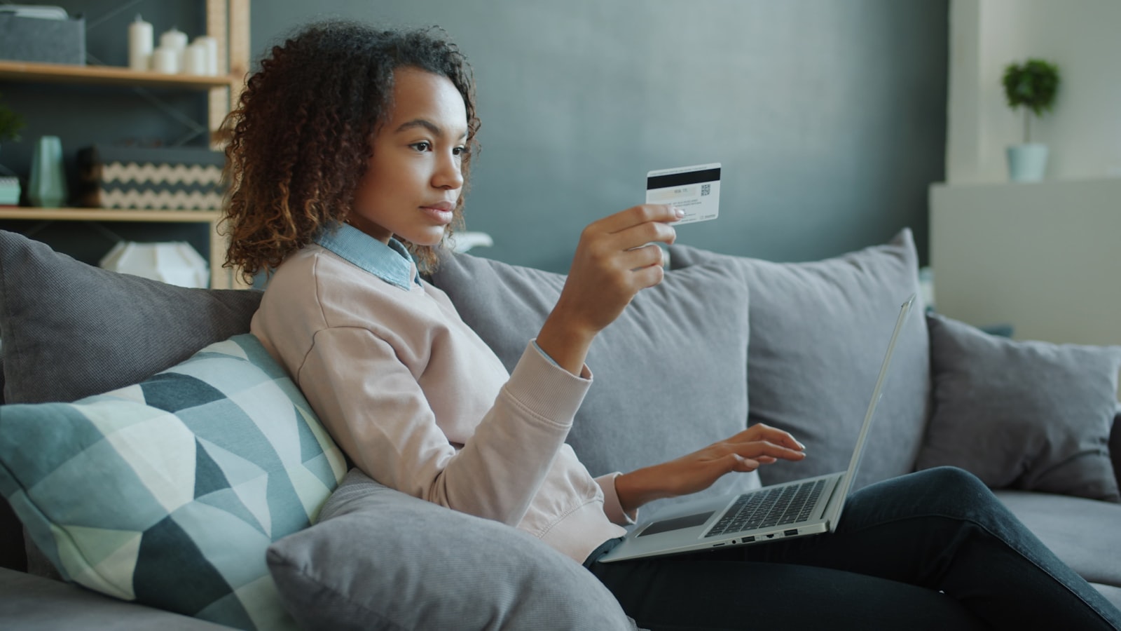 Member managing her checking account online
